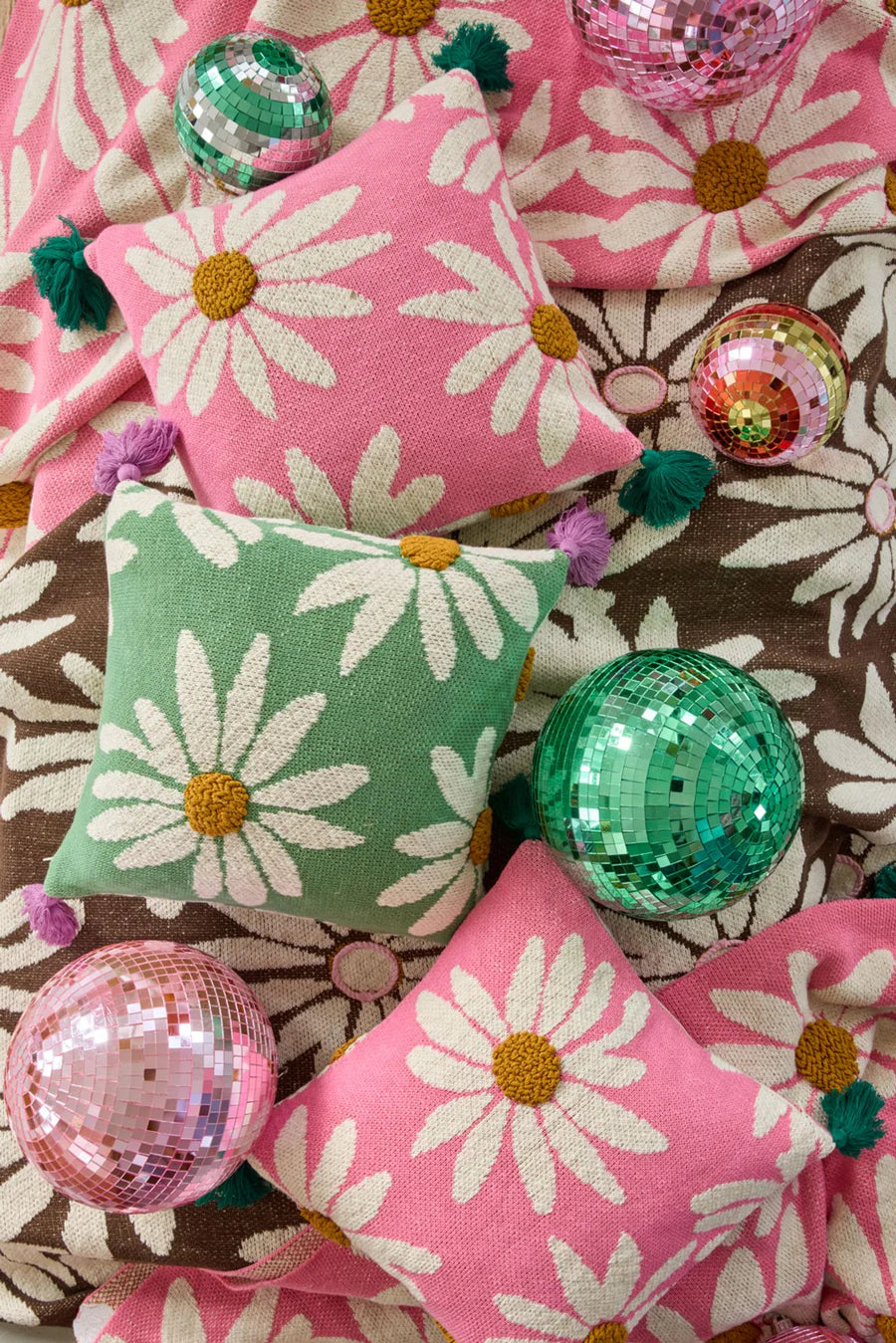 Knitted green cushion